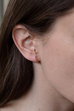 Minimal pair of earrings from " reflection " collection.An everyday wear pair of delicate sterling silver hoops  for pierced ears only.You may nee to adjust them a bit cause every ear is different Available in sterling silver and gold plated silver.This listing is for the silver hoops and not for the double gemstone earring , you will find our "marco" earrings here :https://www.etsy.com/listing/552590333/marco-925-st-silver-earrings?ref=shop_home_active_75This item is made to order ,and it may t Everyday Pierced Ear Cuff, Minimalist 14k Gold Huggie Ear Climbers, Minimalist 14k Gold Hypoallergenic Ear Climbers, Minimalist Ear Climbers For Gift, Classic Everyday Hypoallergenic Ear Climbers, Minimalist 14k Gold Single Ear Climber, Minimalist Hypoallergenic Yellow Gold Ear Climbers, Classic Everyday Ear Climbers With Matching Earrings, Minimalist Gold Huggie Ear Climbers