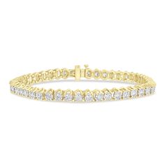 This 10K yellow gold tennis bracelet features 46 lab grown round brilliant cut diamonds, each set to enhance the sparkle with additional metal that amplifies the brilliance of the stones. The unique setting ensures that each diamond catches the light, creating an extraordinary display of shimmering beauty. | 6 ct. tw. Lab Grown Diamond Illusion Bracelet | 10K Yellow Gold | Size 7.00mm | Helzberg Lab Grown Diamonds Illusion Bracelet, Gold Tennis Bracelet, Stone Cuts, Round Brilliant Cut Diamond, Tennis Bracelet, 10k Gold, Chain Link Bracelet, Round Brilliant Cut, Brilliant Cut Diamond