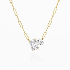 Why have one diamond when you can have two? Our Charo Toi Et Moi Necklaces are the perfect go-to statement. They feature two different diamond shapes for extra sparkle. – Made in 18k solid gold with a high-quality ethically sourced diamond. – Handpicked near colorless Emerald and Round Brilliant Diamonds – Total Carat Weight: 0.45cts – Choice of adjustable chain length, 16 and 18 inches. – Handcrafted just for you in New York City Modern Diamond White Diamond Necklaces, Modern Diamond Cut Necklace In Diamond White, Modern Diamond Cut White Diamond Necklace, Modern Diamond Cut White Necklace, Fine Jewelry Solitaire Necklace With Baguette Cut Diamond Accents, Diamond White Baguette Cut Diamond Necklace, 14k Gold Necklace With Emerald Cut Diamond Accents, Modern Single Diamond Necklace In Diamond White, Emerald Cut Diamond Necklace In 14k Gold