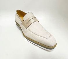 Style: 515-42F-Cream Unique Woven Canvas slip-on Penny Loafer from our Carrucci by Maurice collection features a Calfskin Strap, full Leather Lining, a clean welt and Tricolored Lightweight Rubber Sole! Formal Beige Slip-ons With Leather Sole, White Almond Toe Slip-ons For Business, Formal Beige Slip-ons For Spring, Classic Beige Slip-ons For Office, Beige Slip-on Business Moccasins, White Slip-on Loafers With Contrast Sole, Classic Cream Slip-on Moccasins, White Slip-ons With Stitched Sole For Spring, Summer Cream Slip-on Loafers