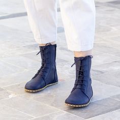 🌌 Crazy Navy Blue Earthing Leather Boots | Nefes Shoes - A Step into Serenity 🌌 Immerse Yourself in a World of Comfort and Connection Introducing the Nefes Crazy Navy Blue Earthing Leather Boots - where timeless elegance meets the grounding essence of nature. These boots are more than a fashion statement; they are an embodiment of a lifestyle in harmony with the earth. 👣 Barefoot Women Boot: Experience Unmatched Freedom Crafted with the ethos of barefoot walking, our boots offer an experience Blue Leather Shoes With Flat Heel, Blue Boots With Rubber Sole, Blue Leather Lace-up Boots, Blue Leather Shoes With Rubber Sole, Blue Round Toe Boots With Vibram Sole, Blue Closed Toe Boots With Rubber Sole, Blue Leather Boots With Vibram Sole, Blue Leather Boots, Navy Blue Boots