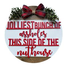 a sign that says jolliest bunche asides this side of the nuthouse