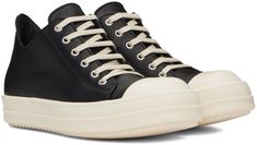 Low-top abrasion-resistant grained calfskin sneakers in black. · Cap toe · Lace-up closure · Eyelets at inner side · Logo-embossed padded calfskin footbed · Buffed calfskin lining · Treaded thermoplastic rubber sole Supplier color: Black/Milk/Milk Black Sneakers With Vulcanized Sole In Calf Leather, Black Calf Leather Sneakers With Vulcanized Sole, High-top Sneakers With Leather Sole For Sports, Black Casual High-top Calf Leather Sneakers, Black Milk, Black Cap, Rick Owens, Low Top, Calf Skin