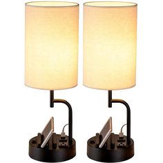 two lamps are sitting side by side on a white background, one is turned off and the other is turned off