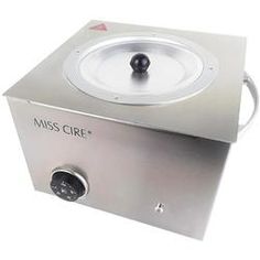 a metal box with the word miss circle on it's side and a black ball at the top