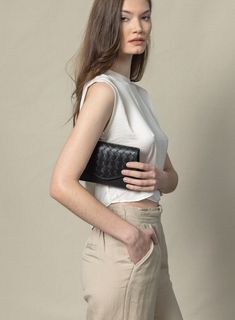 The mini woven Belt Bag comes with a detachable strap and can be worn 5 ways, making this genuine full grain leather belt bag a masters in the art of versatility. Lined with 100% designer cotton. With its delicate and limited interior, this is the perfect companion for the minimalist who travels light. Chic Woven Leather Clutch For Everyday Use, Chic Everyday Woven Leather Clutch, Versatile Everyday Clutch With Magnetic Closure, Everyday Versatile Clutch With Magnetic Closure, Classic Everyday Shoulder Bag With Intrecciato Weave, Classic Intrecciato Shoulder Bag For Everyday, Classic Intrecciato Weave Shoulder Bag For Everyday, Classic Intrecciato Weave Everyday Shoulder Bag, Minimalist Flap Bag With Adjustable Strap