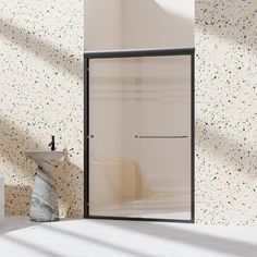 a bathroom with a sink, mirror and shower stall in it's center wall