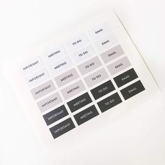 the stickers are on top of each other in black and white colors, with different words