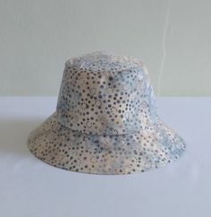 "This trendy bucket hat is practical. Perfect for enjoying sunny day, beach escape, pool side or wearing in the city. Easy packable. Sewn from Batik blue tone with dots cotton fabric  Size: Crown: 22 1/2\" - 57cm Brim: 2 3/4 \" - 7 cm Size can be customized" Trendy Hats, Garden Hat, Bucket Hat Summer, Summer Hats Beach, Gardening Hat, Trendy Hat, Blue Tone, Pool Side, Hat Summer