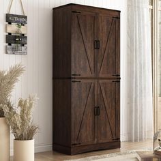 a tall wooden cabinet sitting in a living room next to a plant and potted plants