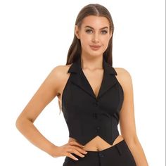 Crop Top Halter Backless Button-Down Notch Lapel Design Pointed Hem Vest
New With Tags
 
Size: Medium
Color Black
Material: 90% Polyester, 10% Spandex
Lining: Polyester
Collar: Halter
Slim Fit

Features
•    Women’s fashion solid color crop top halter, backless button down, pointed hem vest.
•    Made of skin-friendly soft fabric.
•    No pilling, fade resistant & comfortable to wear.
•    Halter with notch lapel design, backless, button down and pointed hem.
•    Works well with shorts, jeans, skirts, shirts and jackets
•    Suitable for all occasions, such as office, shopping, dating, vacation, birthday, events, daily wearing.

Dimensions laying flat : (see photos for more specifics) Width: approximately 14" across top, Length: approximately 17" long.

Also available in large - see other Dressy Vest, Vest Outfits For Women, Colorful Crop Tops, Cropped Vest, Women Halter, Crop Top Outfits, Cropped Tops, Vest Outfits, Suit Vest