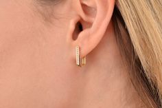 Our rectangle hoop earring is 14k solid gold and its one side is decorated with zircon stones that look charming. It will accompany you every day and everywhere with its minimalist and dainty style. If you think of it as a gift, you can make happy your loved ones on mother's day, birthdays, valentine's day, anniversaries, or graduations. It will be a perfect gift. Its inner diameter is approx. 6.10 mm and the outer diameter is approx. 8.77 mm. 🎁 If you want you can add a gift note for your love Modern Huggie Earrings With Ear Wire For Anniversary, Dainty Style, Solid Gold Earrings, Make Happy, Huggies Earrings, Diamond Earrings, Gold Earrings, Solid Gold, Anniversary Gifts