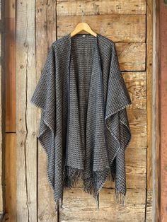 Black wool blanket open front poncho cape wrap Black&white lambswool/bamboo mix long poncho cape Ladies poncho open front wrap cardigan One size fits fashionably for most everyone, short or tall, big or small. This piece is versatile for both Men's & Women's outdoor fashion, and can be used insider in cooler winter weather to keep warm while reading on the couch. CARE: Hand-wash and hang to dry, light iron if needed, or dry clean. MEASURES: Length at the front of the neckline to the bottom is ~1 Womens Outdoor Fashion, Long Poncho, Open Front Poncho, Cape Wrap, Ladies Poncho, Outdoor Fashion, Poncho Cape, Wrap Cardigan, Blue Wool