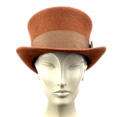 Brown top hat. You can make the hat with your favorite color by choosing it from my Wool felt color card. In the ad, this is the chocolate color Made with chocolate brown wool felt short crown and embellished with a grosgrain ribbon. Edwardian top hat ideal for everyday and special ocasions such as weddings, cocktails or parties. For man and woman. Measurements in centimeters are 32 x 27. Crown height 11. Brim length 6. These measurements may have some slight variation depending on the size of t Classic Brown Top Hat With Flat Brim, Classic Brown Hat For Kentucky Derby, Classic Brown Top Hat For Formal Occasions, Retro Formal Fedora With Wide Brim, Retro Adjustable Fedora For Formal Occasions, Fitted Brown Top Hat With Flat Brim, Adjustable Retro Fedora For Formal Occasions, Brown Fitted Top Hat With Flat Brim, Retro Wide Brim Fedora For Formal Occasions