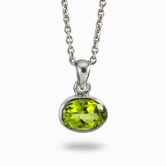 Vivid grassy green with a fiery sparkle, wear this juicy, fresh green gem to add a touch of luxury to your look. Peridot emits warm and friendly energy. Also known as the “gem of the sun”; Ancient Egyptians felt the warm glow of the sun’s energy through the vivid, green glimmer. Peridot provides a shield of protection for its wearer and is an excellent healing stone that helps one strengthen and regenerate the body and mind. Stone Origin: Pakistan Please Note: All pieces shipped within 48 hours Lime Green Sterling Silver Birthstone Jewelry, Classic Lime Green Oval Jewelry, Lime Green Gemstone Jewelry In Sterling Silver, Silver Peridot Oval Jewelry, Sterling Silver Lime Green Gemstone Jewelry, Green Oval Peridot Jewelry, Lime Green Sterling Silver Gemstone Jewelry, Oval Peridot Green Jewelry, Oval Green Peridot Jewelry