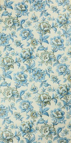 a blue and white floral pattern on fabric