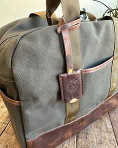 Personalize your bag with a matching full grain leather identification / luggage tag. Small batch handmade in our Omaha, NE studio. Leather Bag Tag, Field Bag, 31 Bags, Horween Leather, Travel Luggage Tag, Duck Canvas, Kit Bag, Style Travel, Leather Luggage