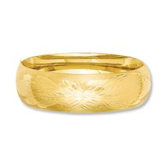 A lovely florentine design adorns this eye-catching bangle bracelet for her. Crafted of 14K yellow gold, the 7-inch bracelet measures 21mm in width. Yellow Gold Bangle With Decorative Band, Yellow Gold Bangle Bracelet With Decorative Band, Yellow Gold Wedding Bracelet With Decorative Band, Yellow Gold Bangle With Decorative Band Gift, Yellow Gold Diamond Cut Bangle, Yellow Gold Bangle With Decorative Band For Wedding, Yellow Gold Wedding Bangle With Decorative Band, Gold Bangle Bracelet With Decorative Band, Wedding Yellow Gold Bangle With Decorative Band