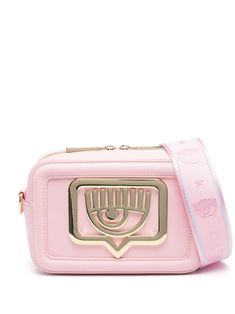 light pink faux leather smooth grain adjustable detachable shoulder strap with signature Eyelike motif signature Eyelike plaque to the front debossed logo to the rear main compartment full lining internal slip pocket internal logo patch gold-tone hardware top zip fastening This piece comes complete with a protective dust bag. Designer Crossbody Shoulder Bag With Logo Plaque, Designer Crossbody Bag With Logo Plaque, Rectangular Travel Bag With Logo Plaque, Gold Crossbody Bag With Logo Plaque, Rectangular Shoulder Bag With Logo Plaque, Pink Shoulder Bag With Metal Logo For Everyday, Everyday Pink Shoulder Bag With Metal Logo, Gold Crossbody Shoulder Bag With Logo Plaque, Gold Crossbody Shoulder Bag With Logo