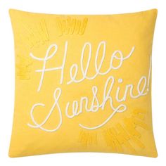 a yellow pillow with the words hello sunshine written in cursive writing on it