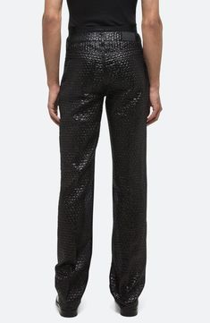 A jacquard-woven 'bubble pack' texture delivers first-class style to these silk-enriched straight-leg pants dispatched down the runway during Peter Do's revival of Helmut Lang. Zip fly with button closure Front scoop pockets; back patch pockets 38% polyamide, 36% polyester, 26% silk Dry clean Imported Designer Clothing Worker Pants, Bubble Pack, Peter Do, Black Pants Men, Straight Leg Trousers, Helmut Lang, Black Fits, Straight Leg Pants, Bubble Wrap