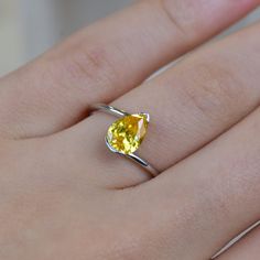 14K Gold Citrine Engagement Ring, Teardrop Cut Citrine Ring, September Birthstone Ring, Anniversary Ring, Gift For Her, Mothers Day Gift Item Gemstone: AAA Grade Citrine  Cubic Zirconia Size: 8*6 Color: Yellow Shape: Pear Average Quality: AAA+ 🎉All of gold options of the product are produced from solid gold. 🎉While using the product, it's healthier to avoid touching the cream and similar products in terms of cleaning the product. 🎉Items are shown larger in pictures to show details-please note the dimensions. Package 🎀 All of these products are sent carefully packed in elegant jewelry boxes. 🎁 How to order 🤳🏼 🎉First step: Click on the product. 🎉Second Step: Select the material. 🎉Third Step: Select the ring size. Production Times⌛ *These items are my shop are handmade made to order Teardrop Solitaire Ring For Proposal, Teardrop Proposal Ring With Center Stone, Fine Jewelry Yellow Pear-shaped Ring, Pear-shaped Birthstone Promise Ring, Sterling Silver Solitaire Pear Rings, Yellow Pear-shaped Ring With Center Stone, Yellow Pear Shaped Fine Jewelry Rings, Pear-shaped Topaz Promise Ring, Teardrop Topaz Promise Ring