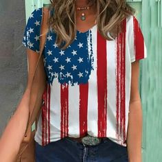 Welcome to our store!  The Women's 4th of July Top is the perfect way to celebrate Independence Day in style. Made from high-quality materials, this top is both comfortable and stylish, making it the perfect addition to any wardrobe. Featuring a classic red, white, and blue color scheme, this top is perfect for any patriotic occasion. With a flattering fit and a stylish design, this top is sure to turn heads wherever you go.  The Women's 4th of July Top is a versatile piece that can be dressed u American Flag Print Cotton Top For Beach, Summer Flag Print T-shirt With Relaxed Fit, White Tops With American Flag Print For Beach, Casual Blue Tops With American Flag Print, American Flag Print Summer Beach Top, Summer Americana T-shirt With Relaxed Fit, White American Flag Print Tops For Beach, American Flag Print Beach Top For Summer, White American Flag Print Top For Beach