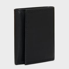 Carry your cards and money in comfortable style with this Extra-Capacity Trifold Wallet from Goodfellow & Co™. This tri-fold wallet features multiple card slots, ID pocket and a bill compartment, while the tri-fold design lends it a non-bulky feel, making it easier to slip in the front or rear pockets of your trousers. Best of all, it features RFID blocking that helps prevent your cards and IDs from digital theft. Showcasing a faux-leather finish in black, it's sure to bring classic style to you Modern Trifold Card Holder With Coin Pocket, Modern Rfid Blocking Trifold Card Holder, Modern Trifold Rfid Blocking Card Holder, Modern Black Trifold Wallet For Everyday Use, Functional Trifold Wallets With Card Slots, Functional Bifold Wallet With Rfid Blocking, Modern Trifold Card Holder For Daily Use, Trifold Wallet With Id Window For Everyday Use, Trifold Wallets With Interior Card Slots For Everyday Use