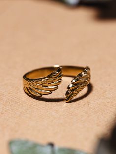 Close up of golden feather/wing ring. Maya Bird, Dainty Delight, Starfish Project, Gold Birds, Bird Ring, Bird Rings, Ring Inspo, Feather Ring, Friendship Rings