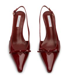 a pair of red high heeled shoes