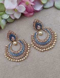 This beautiful pair of blue and gold plated Kundan Meenakari chandbalis is the perfect traditional accessory for any occasion. Crafted from alloy and featuring stunning Kundan stones, these gorgeous earrings will add a touch of glamour to your wardrobe. Features: * Gold and Blue plating * Kundan Meenakari design * Crafted from alloy * Kundan stone detailing Chandbalis Earrings, Jaipur Jewelry, Silk Thread Earrings, Thread Earrings, Gold And Blue, Blue And Gold, Gorgeous Earrings, Pearl Beads, Blue Gold