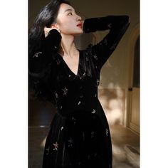 A velvet dress embroidered with brightly blooming flowers. The pretty flowers floating on the black are beautiful, giving off a gorgeous, dazzling and elegant shine. The glossy drape enhances the elegant atmosphere. 
 
 
 Size 
 
 XS size 
 
 Length: 112.5cm 
 Shoulder width: 33cm 
 Bust: 70cm 
 Waist: 56cm (*Stretchable) 
 Sleeve length: 63cm 
 
 S size 
 
 Length: 114cm 
 Shoulder width: 34cm 
 Bust: 74cm 
 Waist: 60cm 
 (*Stretchable) 
 
 Sleeve length: 64cm 
 
 M size 
 
 Length: 115.5cm 
 S Flower Embroidery, Blooming Flowers, The Pretty, Black Is Beautiful, Velvet Dress, Embroidery Flowers, Jet Black, Pretty Flowers, Sleeve Length