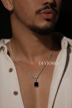 Enjoy our photo gallery. Real customers like you. Real customer satisfaction!  Inspired by the classy look of Hollywood actors,  our pendant necklaces are the perfect solo piece to add some style to your look or layer it with any of our other pendant necklaces. You'll definitely catch complements from someone with this around your neck!   Our Onyx pendants are available in both 18K Gold and Silver.  ▼ Details & Specifications ▼ ♚ Chain Length: 53cm ♚ Chain Width: 2mm ♚ Chain Style: Micro-curb chain ♚ Pendant Size: 20mm x 20mm ♚ Chain Quality: 18k Gold or Silver Premium 316L Stainless Steel ♚ Chain Clasp: Reinforced Lobster ring clasp ♚ Synthetic Onyx Stone detailing ♚ Branded etching ♚ Hypoallergenic, water and sweat resistant ♚ No discoloring or tarnishing ♚ Handmade ♚ Designed in Italy ♚ Black Rope Chain Necklace For Gift, Elegant Black Rope Chain Necklace, Minimalist Black Jewelry For Father's Day, Formal Black Stainless Steel Necklace, Black Sterling Silver Jewelry For Father's Day, Father's Day Black Sterling Silver Necklace, Black Pendant Jewelry With Rope Chain, Elegant Black Jewelry For Father's Day, Black Square Pendant Necklace For Formal Occasions