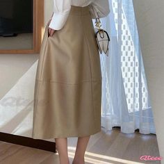 Qteee - Versatile High-Waisted Half-Length Umbrella Skirt in Khaki Casual Plain Long Skirt, High Waist Solid Beige Skirt, Casual Full-length Skirt For Workwear, High Waist Beige Maxi Skirt, Casual Plain Skirt, Casual Plain Skirt For Fall, Solid Beige Skirt For Fall, Solid Color Beige Skirt For Fall, Casual Flared Skirt Bottoms For Office