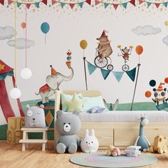 a child's bedroom with circus themed wallpapers and toys on the floor