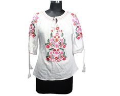 Colour : White Top with floral embroidery  Its a beautiful Women Top which fits to Size - XS,S  Chest- 38'' Length-21 inch '' Fabric : 100% Cotton Breathable Fabric, very soft and comfortable Top. It's a super breathable and soft cotton shirt, light weight, coat collar front vintage slim fit tunic classic top. Occasion : Perfect for your daily wear, outdoor activity, dates and parties....And your occasion is perfect in spring, summer and fall. 💖 Care and love To preserve the allure of this mast Spring Traditional Embroidered Fitted Top, Traditional Spring Peasant Top With Embroidered Neckline, Traditional Floral Embroidered Top For Spring, Spring Folk Embroidered Top With Floral Embroidery, Fitted Traditional Embroidered Top For Spring, White Folk Style Top With Resham Embroidery, White Folk Style Embroidered Top With Resham Embroidery, Traditional Tops With Resham Embroidery For Spring, Traditional Blouse With Resham Embroidery For Spring