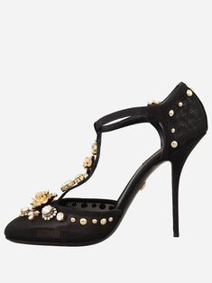 The Dolce & Gabbana Crystal Embellished T-strap Pumps feature a high stiletto heel and an almond toe. Featuring embellishment, these ankle boots are detailed with gold rose detail clear crystals for luxurious finish. Luxury Embroidered Evening Heels, Luxury Gold Almond Toe Boots, Luxury Gold Boots With Almond Toe, Rosé Details, Sneaker Jewelry, Wedge Pumps, Strap Pumps, Clear Crystals, Pump Sandals