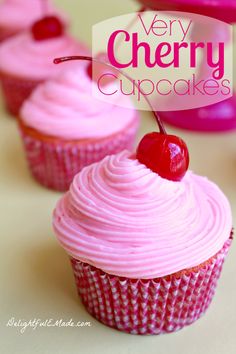 very cherry cupcakes with pink frosting and cherries on the top are ready to be eaten