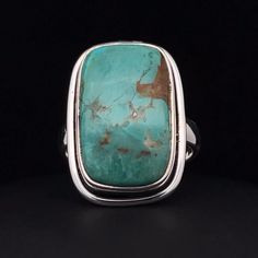 * Sterling Silver ring with Kingman Turquoise  * The face of this ring measures about 23mm X 15mm * This ring is size 7 * You will receive the exact ring pictured. Unique Rectangular Turquoise Ring, Adjustable Turquoise Chrysocolla Ring, Rectangular Turquoise Gemstone Ring, Large Stone Turquoise Ring In Chrysocolla, Turquoise Chrysocolla Ring With Large Stone, Round Rock, Ring Pictures, Kingman Turquoise, Rings Statement