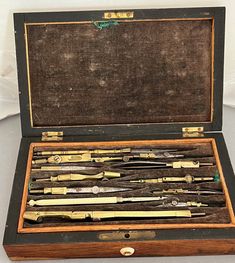 an old wooden box filled with lots of tools