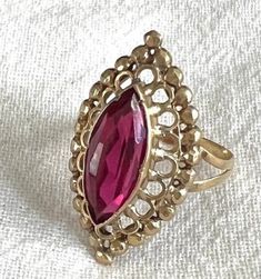 Gold Marquise Ruby Ring, Marquise Ruby Ring In Gold, Vintage Marquise Ruby Rings, Vintage Marquise Ruby Ring In Red, Vintage Red Marquise Ring, Vintage Marquise Cut Ruby Ring In Yellow Gold, Gold Marquise Cut Ruby Ring, Gold Ruby Ring With Marquise Cut, 14k Gold Ruby Ring With Marquise Cut