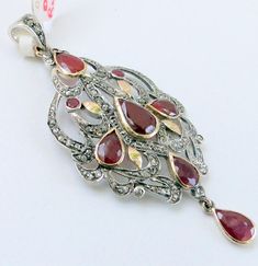 Item-vintage victorian style rose cut diamond and ruby gemstone pendant. total weight-8 grams, weight of rubies-12 carat, old cut flat round diamond weight-2.7 ct, 14 ct gold weight-4.900 gms, size of pendant-6.5/3 cm, Antique Diamond Pendant Necklace With Accents, Antique Pendant Diamond Necklace With Accents, Antique Diamond Accent Pendant Necklace, Victorian Diamond Necklace With Single Cut Diamonds As Gift, Antique Pendant Necklace With Diamond Accents, Vintage Pendant Diamond Necklace With Single Cut Diamonds, Victorian Style Diamond Pendant Necklace, Antique Diamond Necklace With Single Cut Diamonds, Luxury Ruby Jewelry With Rose Cut Diamonds