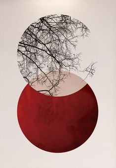 an abstract painting with red and white circles, branches in the center on a light grey background