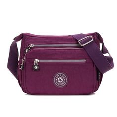 Feature: * Condition: 100% Brand New And High Quality * Material: Canvas * Color: Black/Purple/Blue *Dimensions: 25x 20 X 10cm/9.8"X 7.9"X 3.9" Specification: 1) With Zipper Closure For The Main Pocket 2) One Zipper Closure Pocket Inside 3) One Zip Closure Pocket At Back 4) Two Zip Closure Pockets At Front 5) Shoulder Strap Length Adjustable Large Capacity Purple Crossbody Bag, Purple Large Capacity Crossbody Bag, Large Capacity Purple Nylon Bag, Versatile Purple Nylon Shoulder Bag, Functional Purple Crossbody Bag, Versatile Large Capacity Purple Bag, Purple Portable Bags For Daily Use, Purple Nylon Bags For Outdoor Use, Functional Purple Shoulder Bag