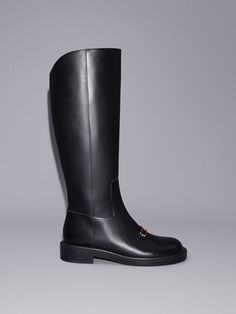 The latest addition to our Gabine family comes in the form of these knee-high boots that will instantly upgrade your winter style. Keeping the design sleek and streamlined, except for the subtly curved top edges, the focal point of these shoes are undoubtedly the interlocking U-shaped buckles that gleam gold against the matte black finish of the boots. Made from genuine leather for a luxurious look and feel, they are definitely an investment piece made to stand the test of time. Brand Collaboration, Size Chart For Kids, Charles Keith, Low Block Heels, Boots Knee, Winter Style, Belt Size, Leather Material, Knee High Boots