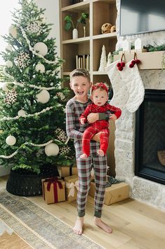 Embrace the magic of the holiday season with our Green Plaid Bamboo Cozy Set, perfect for making cherished memories with the whole family. Crafted from ultra-soft and breathable bamboo fabric, this festive set ensures a cozy and comfortable night's sleep. Available in sizes from 18 months to 11/12 years, it's perfect for your little ones, while matching adult pajamas let everyone join in on the fun. Ideal for Christmas morning photos, holiday movie nights, or simply enjoying the winter season together in style. Get ready to create lasting traditions with this charming plaid set! 95% Bamboo 5% Spandex Wash in cold water, Tumble dry low. Measurement in inches: Measurement in inches: Top: Length: 6-12 11, 18 12, 2T 12.75, 3T 13.5, 4T 14.5, 5/6 15, 7/8 17, 9/10 19, 11/12 21.5 Width: 6-12 9.25, Graphic Onesies, Toddler Education, Diaper Bag Accessories, Nursing Accessories, Toddler Fall, Cozy Pajamas, Nursery Accessories, Onesie Pajamas, Baby Bottoms