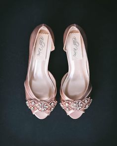 Dress up your trip down the aisle with these blinged out bridal shoes!  Made to order for each bride, these low heel, open toe wedding heels are shown here in blush and feature our custom-curated rose gold crystal applique on the toe and a rose gold crystal covered heel.  Want to see other designs by Ellie Wren? Check out are full Etsy Shop here: https://www.etsy.com/shop/EllieWrenWeddingShoe Color Changes Love this design, but wishing it was in a different color? We can do that! Please use the dropdown menu to select a different color.  Base Shoe Style Changes We can adapt this design to a variety of base shoe styles, so if you'd prefer a flat, a wedge, or a towering stiletto, we can do that for you. View our other base shoe styles here: https://www.dropbox.com/s/gzufc38rj4ux9lj/Base%20Sh Pink Embellished Heels For Wedding, Pink Glamorous Wedding Shoes With 4-inch Heel, Pink Heels With 4-inch Heel For Wedding, Glamorous Pink Wedding Shoes With 4-inch Heel, Pink 4-inch Heel Wedding Shoes, Pink Low Heel Wedding Shoes, Rose Gold Open Toe Heels For Wedding, Pink Closed Toe Wedding Shoes, Pink Almond Toe Heels For Wedding