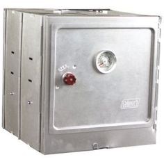 a large metal box with two gauges on the front and one in the back