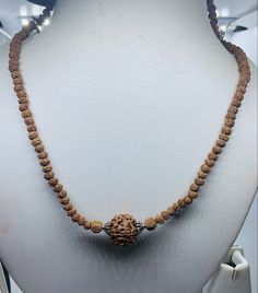 Welcome, Namaste  100% AUTHENTIC  RUDRAKSHA NECKLACE RUDRAKSHA MUKHI FACE - 5 FACE LENGTH OF NECKLACE CHAIN  - 40 CM CHOKER NECKLACE FEATURES - 12 mm panch mukhi Rudraksha IN MIDDLE OF 108 SMALL RUDRAKSHA 4 mm BEADS with lobster hooks at end to open and close We offer 100% Money Back, No Questions Asked. Bid with confidence. The beads of this mala are 100% original and genuine. Adjustable Gemstone Beads Jewelry For Festivals, Spiritual Single Strand Round Jewelry, Spiritual Single Strand Necklace For Meditation, Spiritual Single Strand Jewelry, Symbolic Gemstone Beads Jewelry For Meditation, Spiritual Jewelry With Gemstone Beads For Festivals, Spiritual Necklaces With 8mm Beads For Rituals, Holistic Necklaces With 8mm Beads For Rituals, Holistic Jewelry With 108 Beads For Rituals