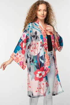 This elegant Malini kimono, by our friends at Sevya Handmade, is crafted with 100% Cupro material for a luxurious yet sustainable option. Its lightweight, breathable composition gives it a similar silk-like feel while significantly reducing care needs. Free-size designed with a floral pattern, this fair-trade garment will provide you with long-lasting comfort. Sevya, derived from Sanskrit, translates to "caring through service". Dedication to preserving India's unique arts and cultures is shown V-neck Silk Summer Robe, Silk V-neck Robe For Summer, Floral Print Kimono For Loungewear, Flowy Kimono For Spring Loungewear, Spring Loungewear Kimono One Size, Flowy Kimono For Daywear, One Size V-neck Kimono For Spring, Spring Silk Wrap Robe, Spring Silk Kimono With Kimono Sleeves